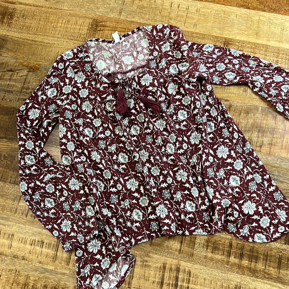 Beautiful maroon long sleeve shirt.  Woman’s size M